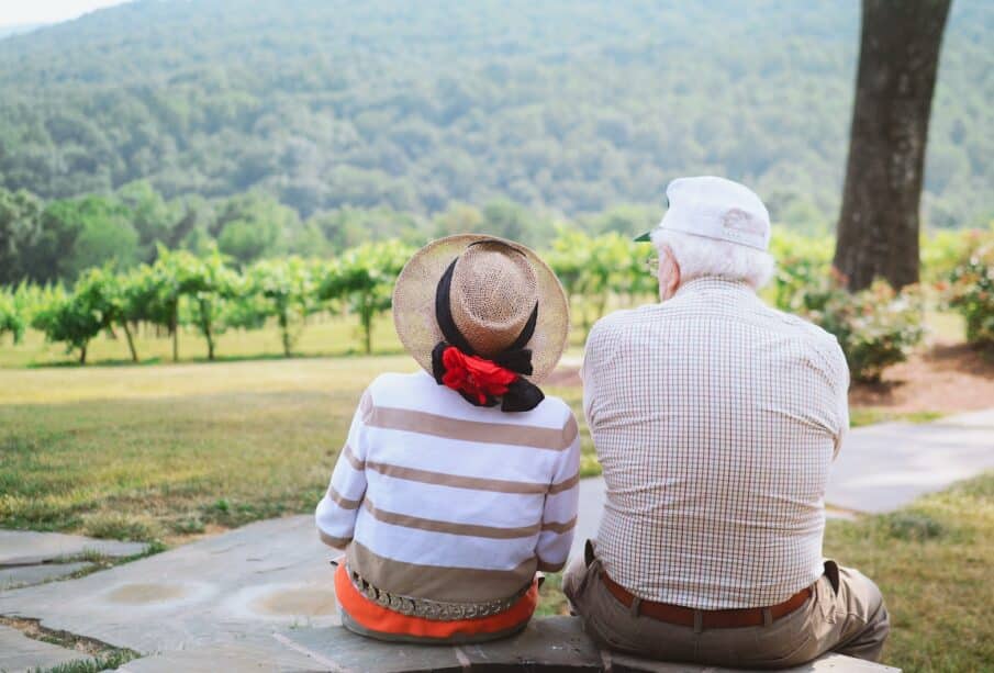 couple sitting on pathway